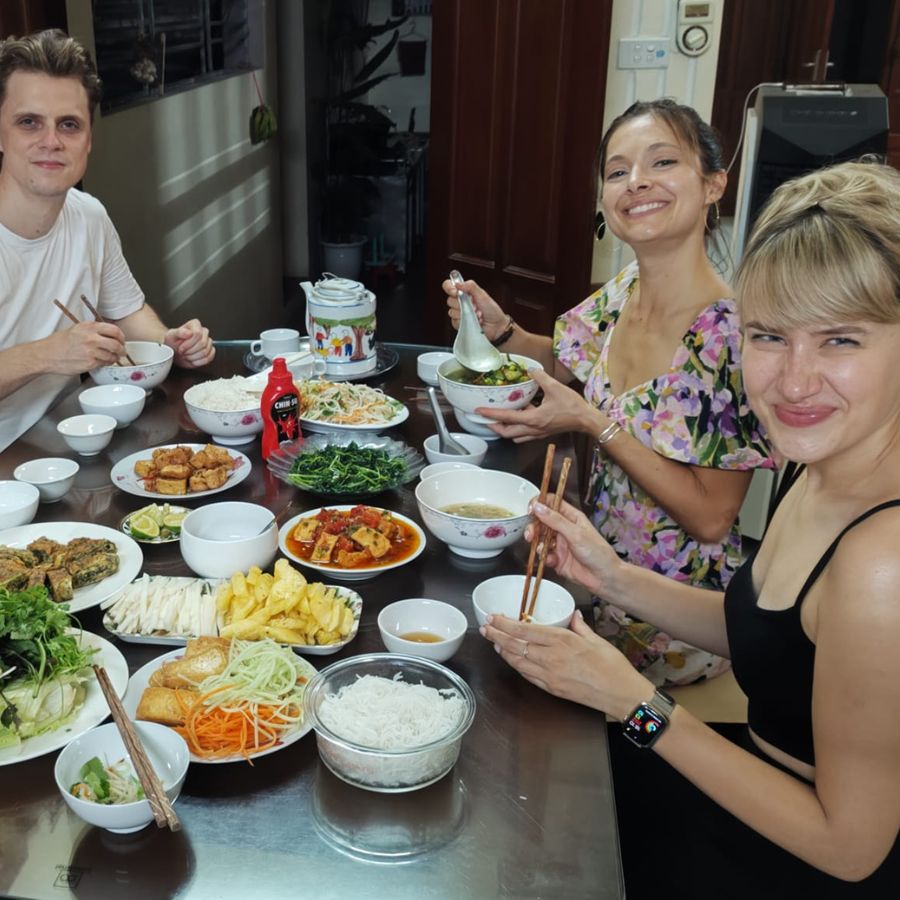 having dinner with local family in farm tour and cooking class with local family in hanoi tours