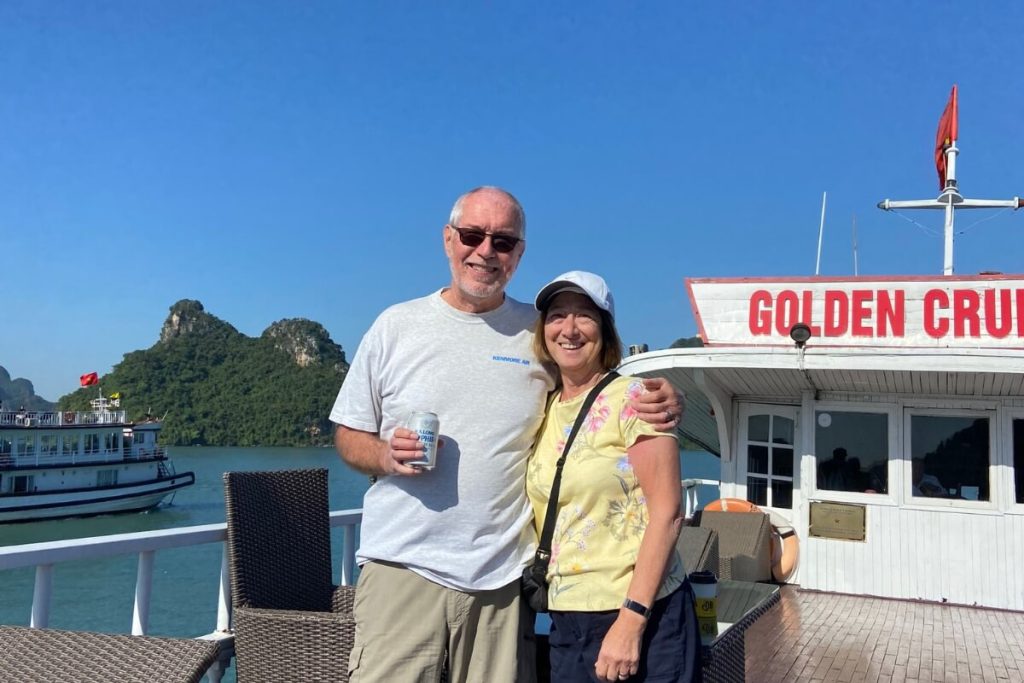 A couple enjoy the beauty of Halong Bay