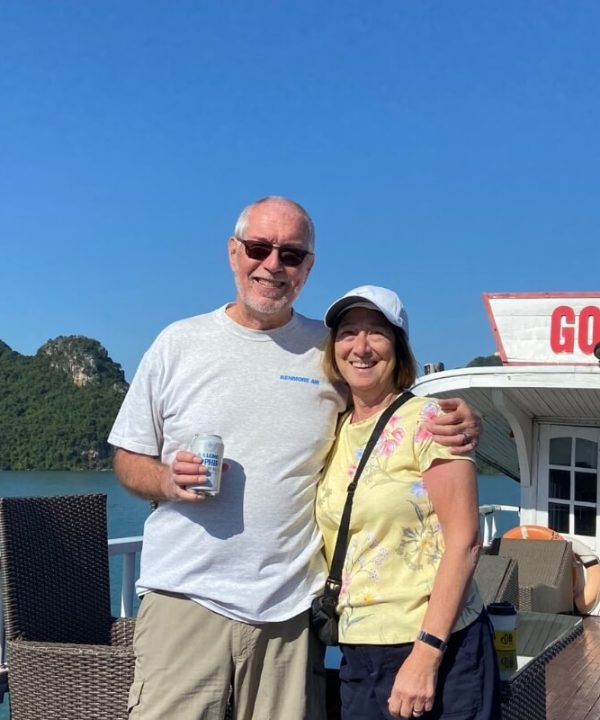A couple enjoy the beauty of Halong Bay