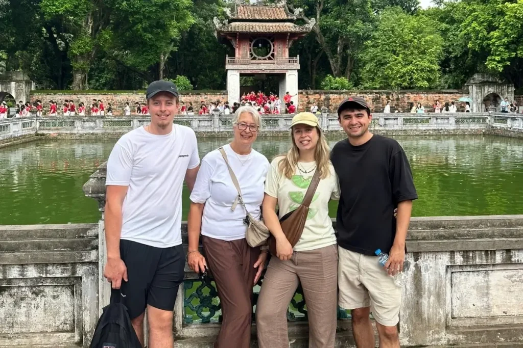 A family visit Temple of Literature in Hanoi tours