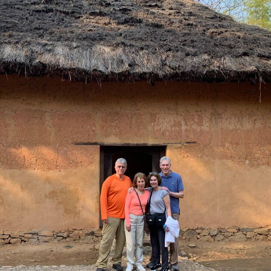 A family visit peaceful countryside village in Hanoi