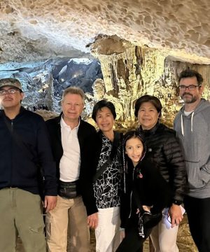 A family visit the Surprise Cave in Hanoi Halong Bay Tours