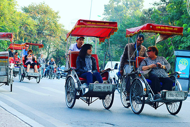 Cyclo around the old town of Hanoi
