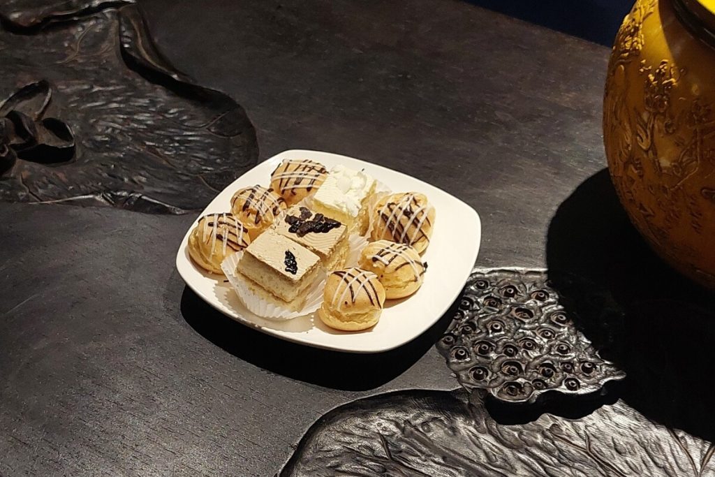 Enjoy lotus tea and macarons in Hanoi Spiritual & Cultural Journey with the Hầu Đồng Ritual