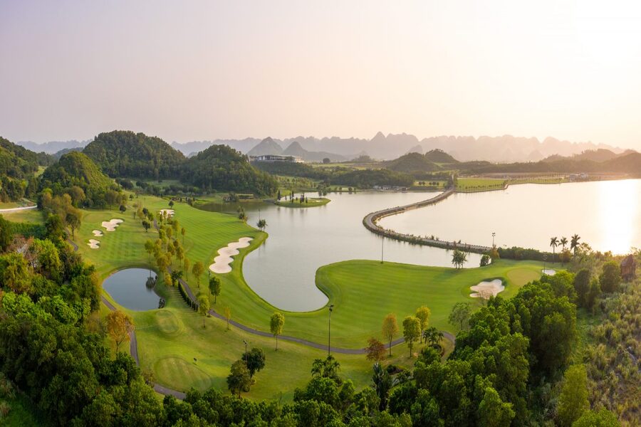 Fairways, bunkers and lake at BRG Legend Hill Golf Resort in Hanoi