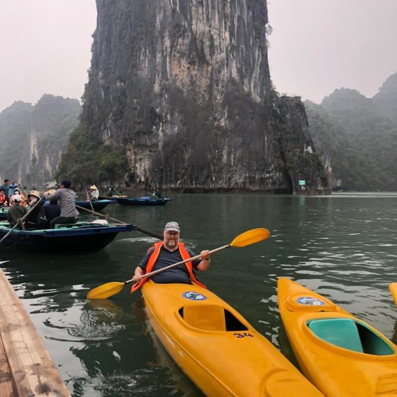 Kayaking in Halong Bay with best hanoi tour agency - hanoi local tour