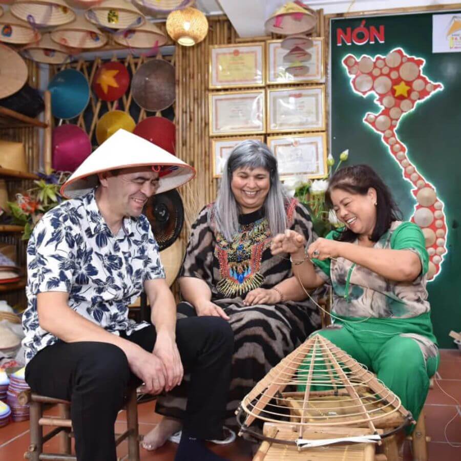Local artisan makes conical hat in Chuong Conical Hat Village Tours From Hanoi