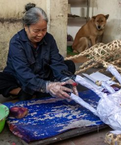 Making votive paper in Phuc Am Village - Hanoi Tours