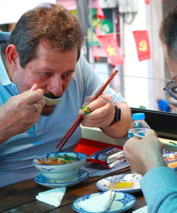 Taste Vietnames Pho in Hanoi Cultural Walking Tour Half Day
