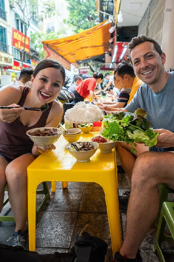 Taste the must-try street food dishes on your Hanoi North Vietnam Tour