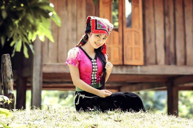 Thai Woman in Traditional House