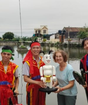 Visiting Hong Quang Water Puppet Village with Hanoi Local Tour