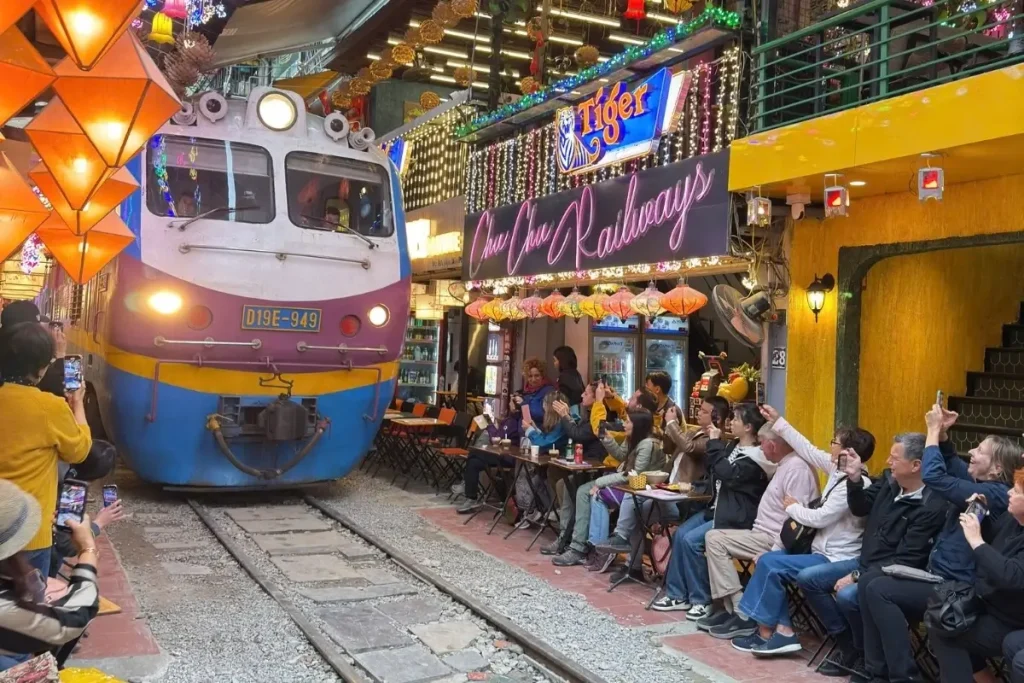Watching the Hanoi Train Street in Hanoi Tours