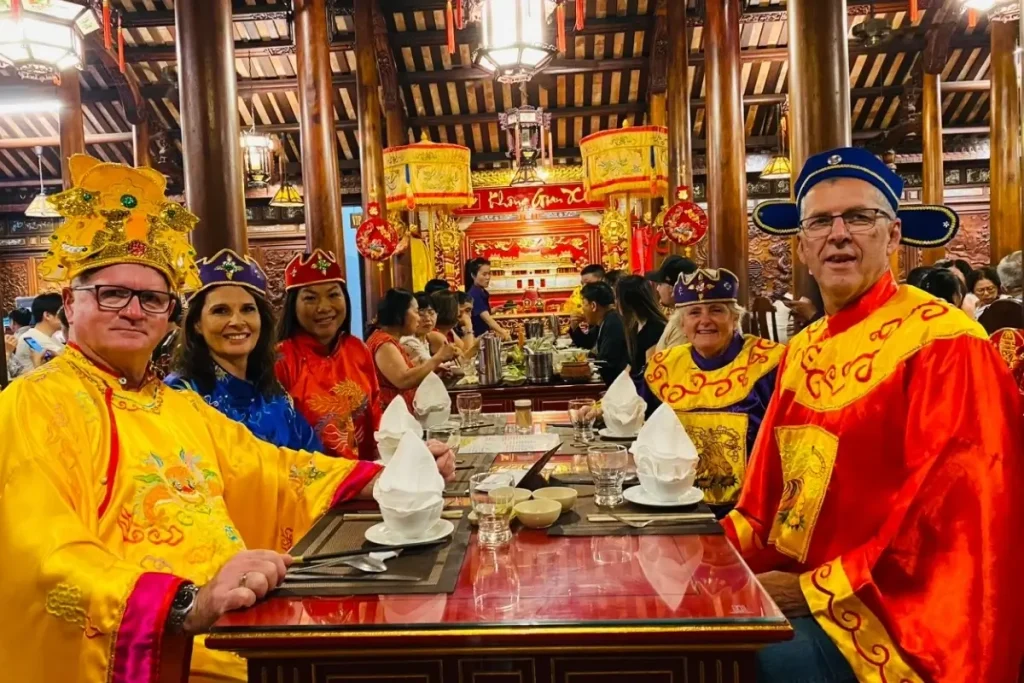 Wearing traditional clothes in Vietnam - hanoi tour packages