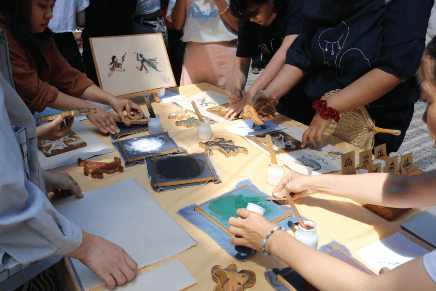 Young people try to make Dong Ho picture in countryside trip from Hanoi