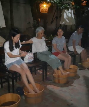 a herbal foot bath in Ecohost Nam Dinh - hanoi day tours