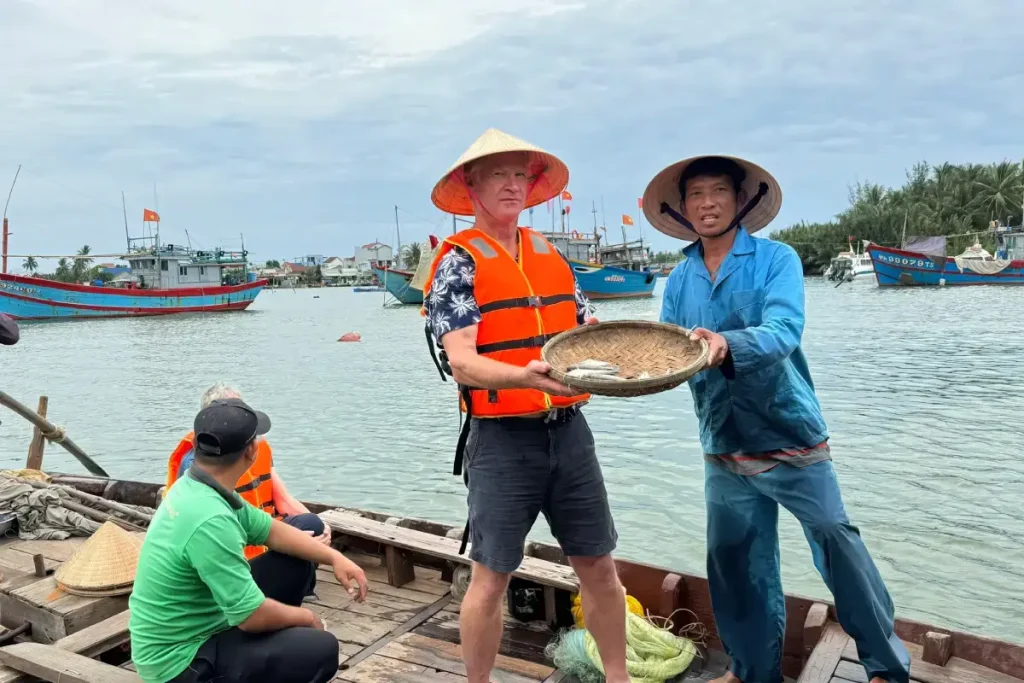 catching fish with local people in hanoi vietnam tours operated by hanoi local tour
