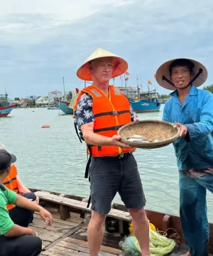 catching fish with local people in hanoi vietnam tours operated by hanoi local tour