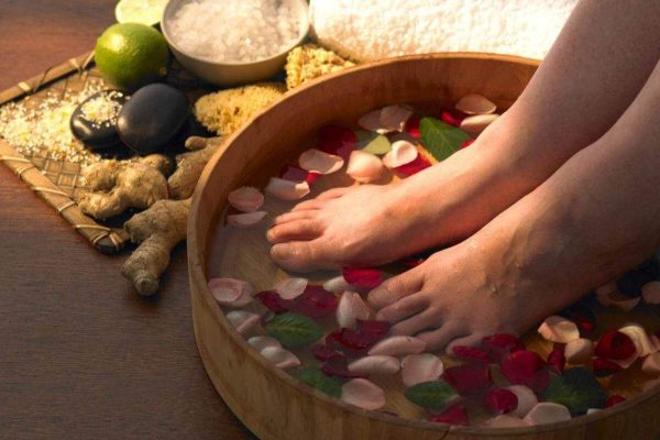 return to Quan Anh Heritage House for a rejuvenating herbal foot bath - hanoi tours