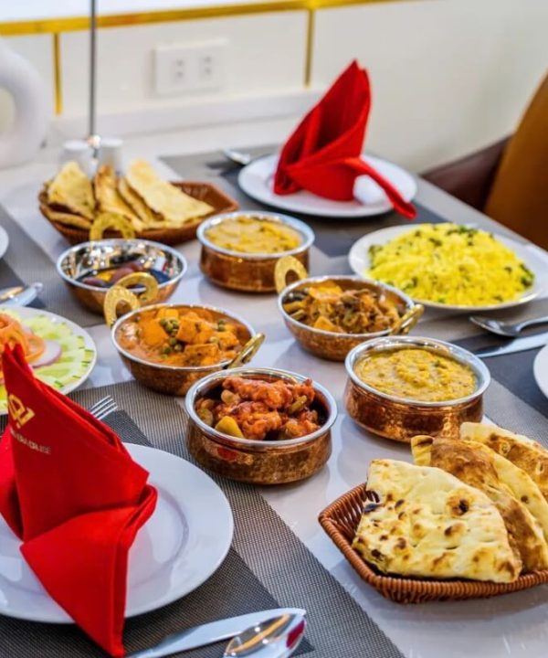 experience authentic Indian cuisine prepared by a dedicated Indian chef onboard