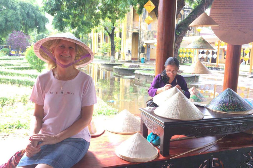 happy customer in Chuong Conical Hat Village Tour
