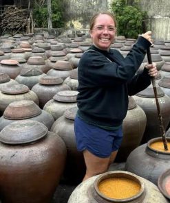 happy customer in ban yen nhan soy sauce village tour - hanoi local tour