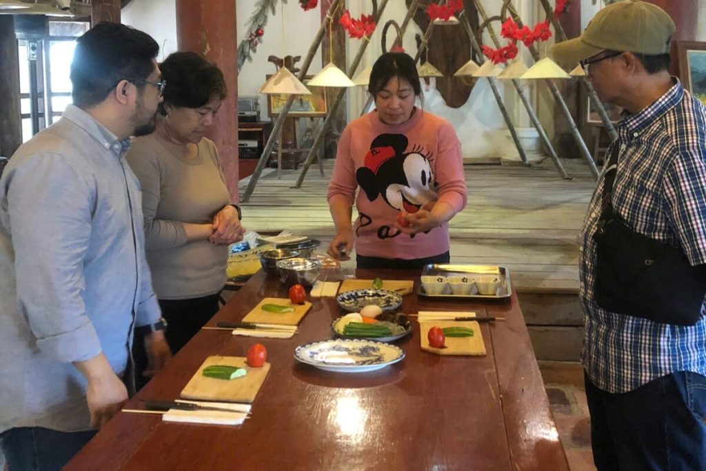 participate in a cooking class at the restaurant on the cruise in Halong Bay Day Tour From Hanoi