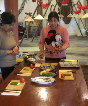 participate in a cooking class at the restaurant on the cruise in Halong Bay Day Tour From Hanoi