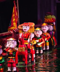 take part in the Puppet Making Heritage activity in Dao Thuc Village - Hanoi Tours