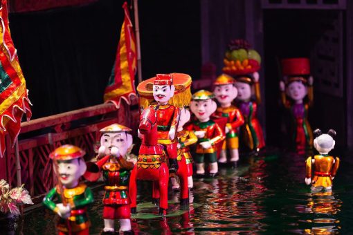 take part in the Puppet Making Heritage activity in Dao Thuc Village - Hanoi Tours