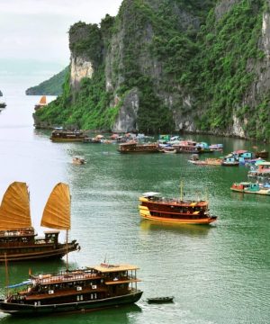 transfer to Tuan Chau Marina to begin cruise through Ha Long Bay