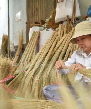 visit a local household where traditional straw brooms are handmade in Nam Dinh - Hanoi Tour