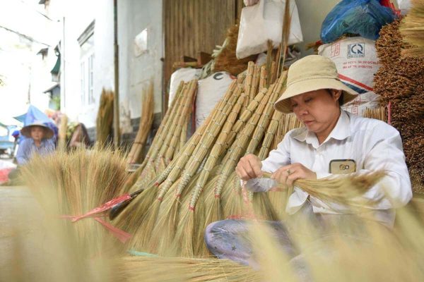 visit a local household where traditional straw brooms are handmade in Nam Dinh - Hanoi Tour
