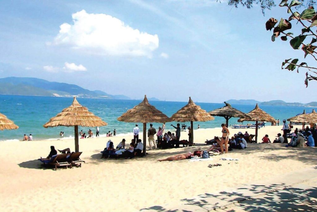 walk along Bai Chay beach in halong bay tours
