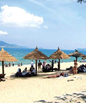 walk along Bai Chay beach in halong bay tours