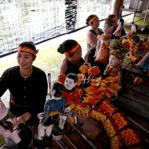 water puppet village - hanoi local tour