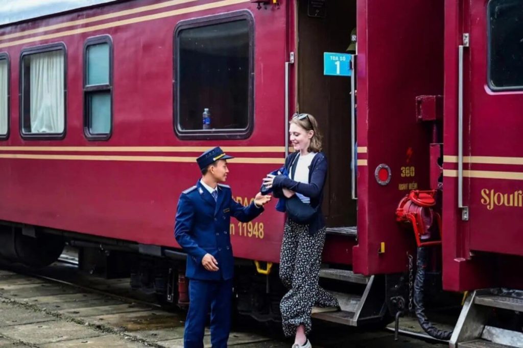 welcomed and guided to board the Vietnam luxury train