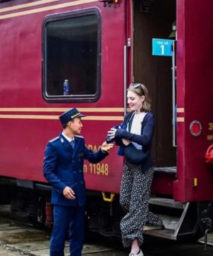 welcomed and guided to board the Vietnam luxury train